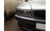 накладки на фари нижні BMW E38