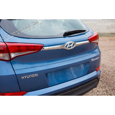 накладка на кришку багажника з вирізом під знак Hyundai Tucson