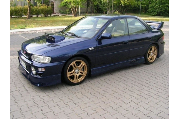 тюнінг накладки на бічні пороги Subaru Impreza J-SPEC